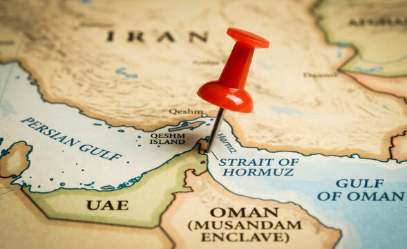 close up of red pin on Hormuz strait map in Iran concept of Iran, Usa and Israel war and energy crisis and blockade