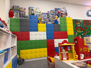 Fototapeta premium Colorful oversized lego wall in playroom
