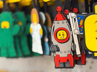 Fototapeta premium Smiling lego astronaut rocket keychain