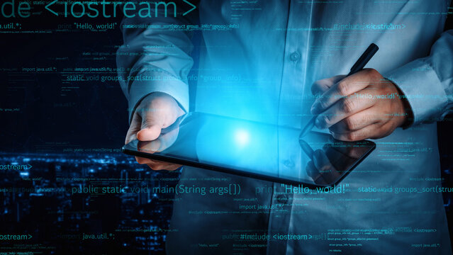 A user interacts with a digital tablet in a high-tech environment filled with data streams and code elements, highlighting themes of innovation and technology. Xenic