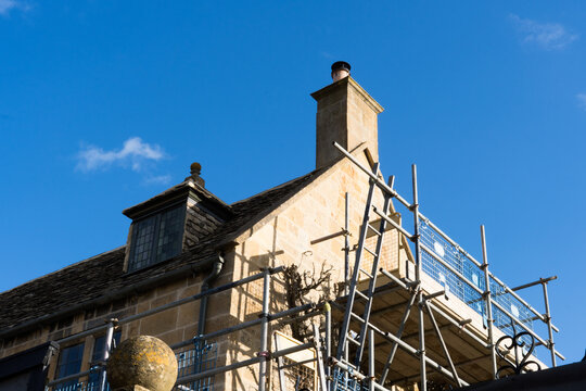 Scaffolding on a historic house in an English village