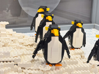 Fototapeta premium Lego emperor penguins on snowy diorama