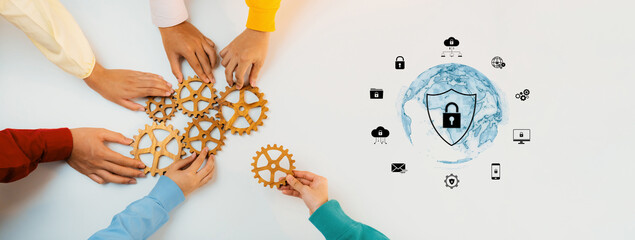 Collaborative hands are arranging gears symbolizing teamwork and strategy for global security,...
