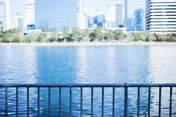 Bridge railing along the lake at Benjakitti Park, greener Bangkok, Thailand.