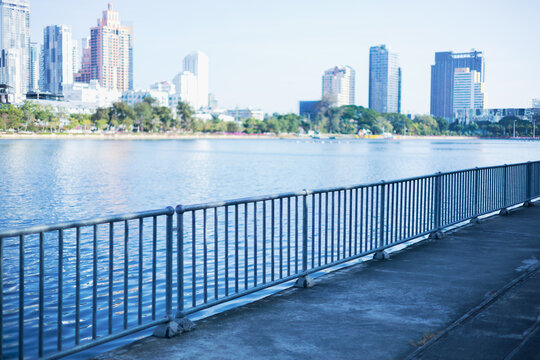 Bridge railing along the lake at Benjakitti Park, greener Bangkok, Thailand.