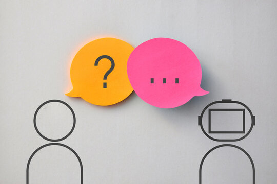 Human and AI Conversation Concept with Question and Answer Speech Bubbles