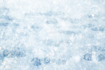 Obraz premium Footprints in the snow, winter background, pavement surface with footprints in the city, winter weather background