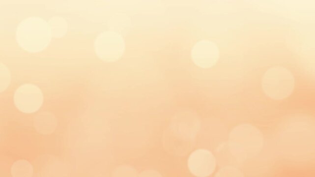 オレンジ　玉ボケ　ループ動画　シンプル　抽象的　パステルカラー　キラキラ　パーティクル　Soft orange glowing background.Abstract bokeh lights,pastel warm tone.Loop video.