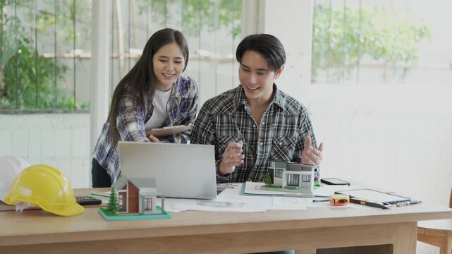 Engineers, architects, and technicians are analyzing structural design drafts in meetings with tabletop blueprints and discussing the project collaboratively in office meetings.