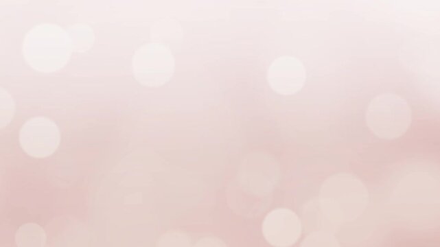 ベージュ　クリーム　玉ボケ　ループ動画　シンプル　抽象的　パステルカラー　キラキラ　パーティクル　Soft beige glowing background.Abstract bokeh lights,pastel warm tone.Loop video.