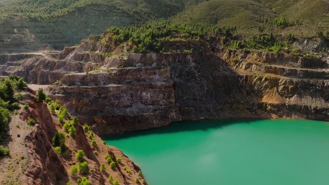 Turquoise lagoon quarry aerial drone Evia Greece mining landscape