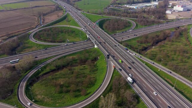 Cloverleaf highway interchange aerial view road infrastructure Italy
