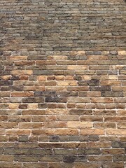 Naklejka premium aged brick wall with weathered texture