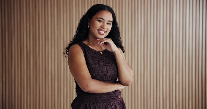 Face, confidence and business woman in creative office, pride and happy event planner. About us, smile and portrait of venue coordinator, person and worker on wall background with space in Brazil