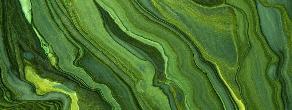Dark green abstract fluid art background with emerald liquid marble texture effect in acrylic pour painting style