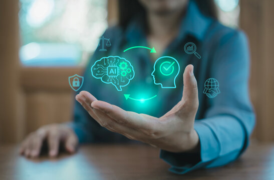 AI Governance and Human-in-the-loop ethical control concept, Hand holding a glowing green hologram of an AI brain and human head cycle, trust, collaboration, compliance law security safety, management