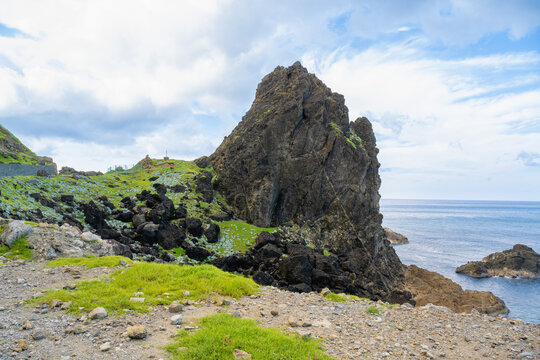 LANYU, TAIWAN &ndash; JANUARY 25, 2025: Massive volcanic rock formation and steep agglomerate cliffs on the coast of Lanyu, Taiwan.