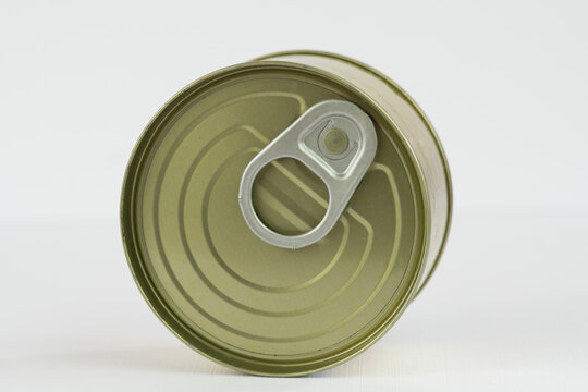 empty tin can open food container side and top view metal texture gold aluminum material on white background with copy space for banner design concept of food industry, packaging, recycling