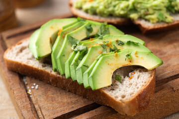 Sourdough bread toast with avocado topping. Vegan snack