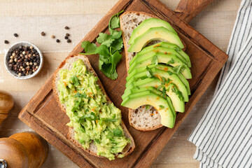 Sourdough bread toast with avocado topping. Vegan snack