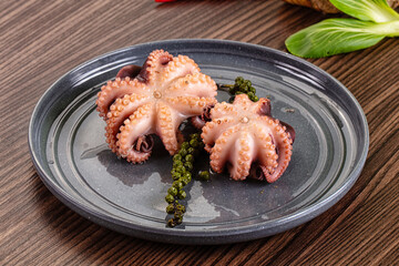 Gourmet Boiled octopus in the bowl © Andrei Starostin