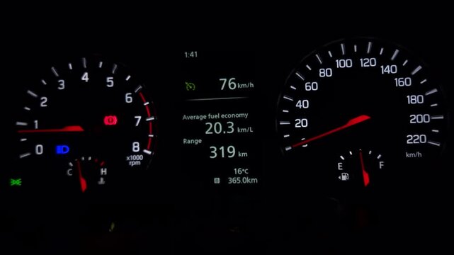 Car Dashboard Instrument Cluster Close-Up at Night, Illuminated Speedometer, Tachometer and Fuel Economy Display, Modern Vehicle Driving Interface, Automotive Technology 4K Footage