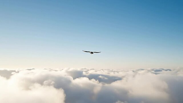 An airplane flies through a clear blue sky above fluffy white clouds.