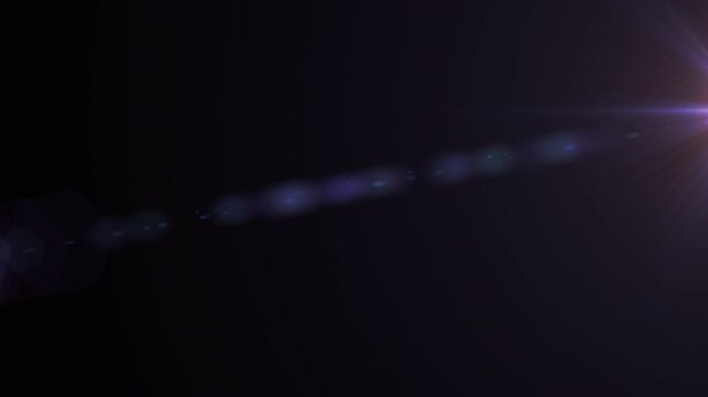 Horizontal anamorphic lens flare transition with long glowing streaks. 4K video with alpha channel, transparent background.