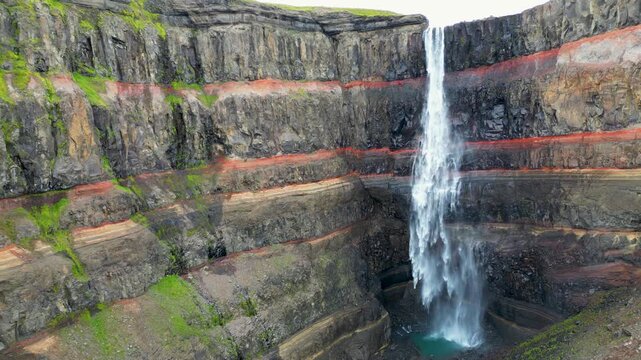Aerial view of Haifoss waterfall and basalt canyon in Iceland Highlands