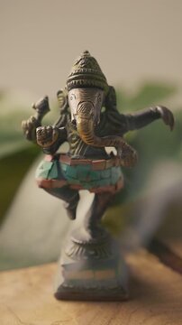 Dancing Ganesha Statue In Smoke Meditation Background Vertical