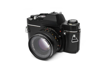 Fototapeta premium Classic black Vintage SLR Film Camera with 50mm Lens there are signs of wear and tear from age isolated on White Background. Photography, nostalgia, and retro technology design concepts.