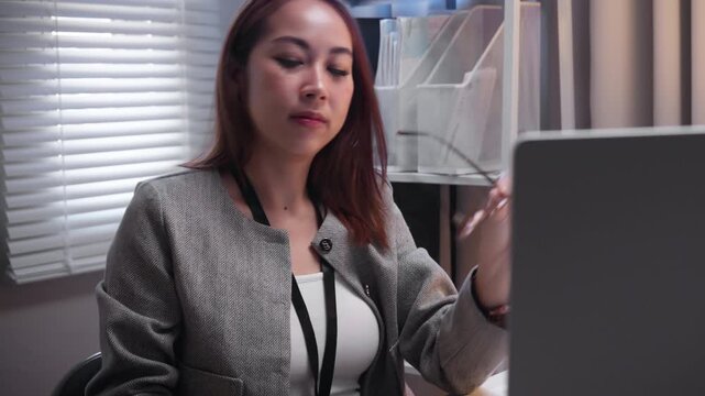 Exhausted Female Professional Feeling Stress and Burnout at Desk with Computer, Work-related Pain Relief