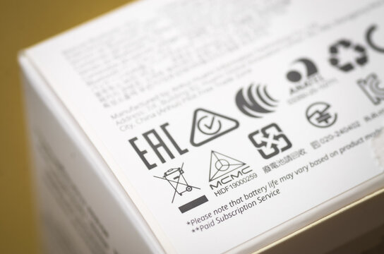 Klang, Malaysia: March 18th, 2026- Close Up of EAC MCMC and Recycling Logos on Electronics Packaging