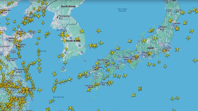 Air traffic map over Japan and Korean Peninsula with live flights, Aviation routes visualization showing aircraft positions and dense traffic