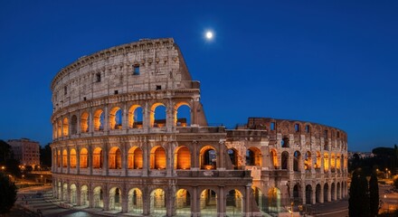 Obraz premium Ancient amphitheater illuminated at dusk under a full moon