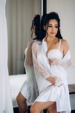 preparations for the bride with the dressing of the wedding dress