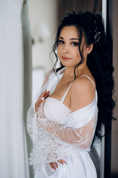 preparations for the bride with the dressing of the wedding dress