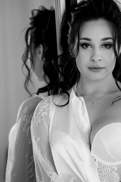 preparations for the bride with the dressing of the wedding dress