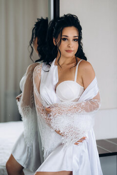 preparations for the bride with the dressing of the wedding dress