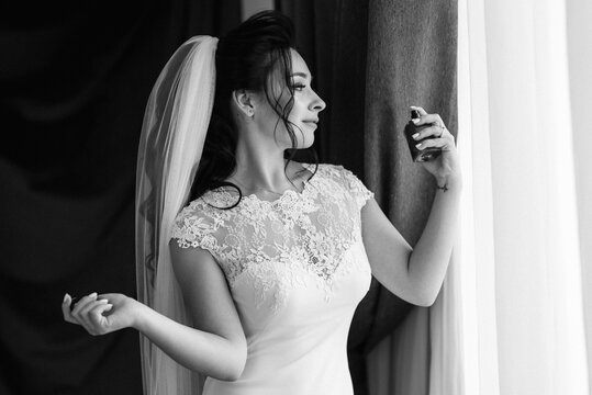 preparations for the bride with the dressing of the wedding dress