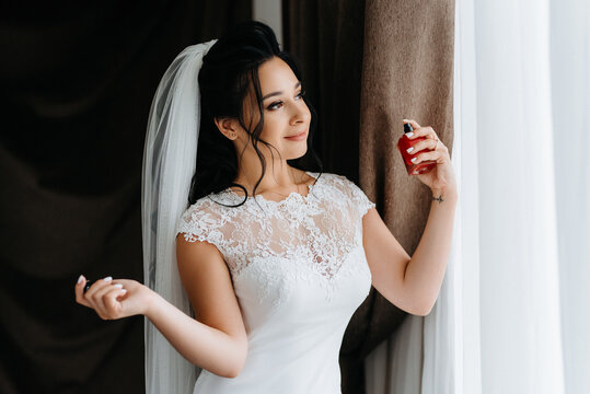 preparations for the bride with the dressing of the wedding dress
