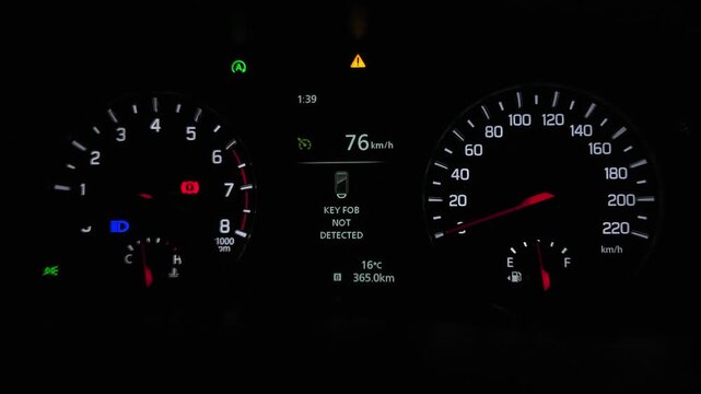 Car Dashboard Instrument Cluster Close-Up at Night, Illuminated Speedometer, Tachometer and Fuel Economy Display, Modern Vehicle Driving Interface, Automotive Technology 4K Footage