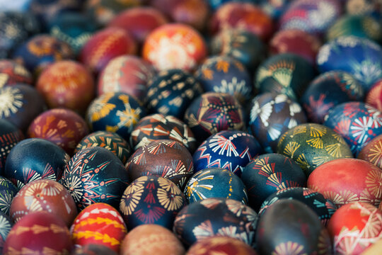 Traditional Lithuanian wooden colorful Easter eggs, symbol of fertility and life painted with the symbols of nature, close up