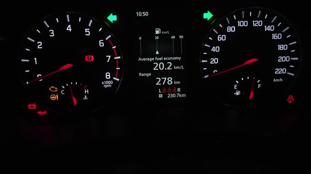 Car Dashboard Instrument Cluster Close-Up at Night, Illuminated Speedometer, Tachometer and Fuel Economy Display, Modern Vehicle Driving Interface, Automotive Technology 4K Footage