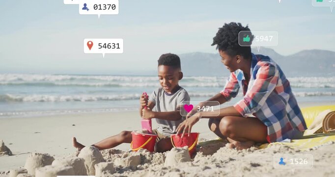 Mom and son making sand towers, son pressing pink mold and attracting social media reactions