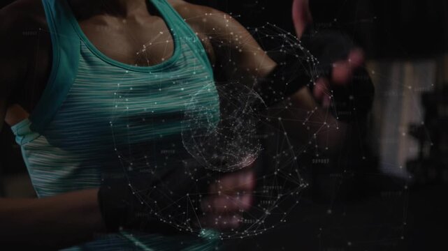 Vertical video: Woman bringing hands close, guiding particle sphere, tightening glove for training