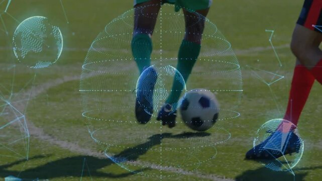 Dribbling green-kit player guiding black-and-white soccer ball on grass pitch, holographic overlay