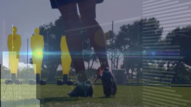 Moving soccer ball, shooter closing and shooting on pitch, training with dummies and keeper bib