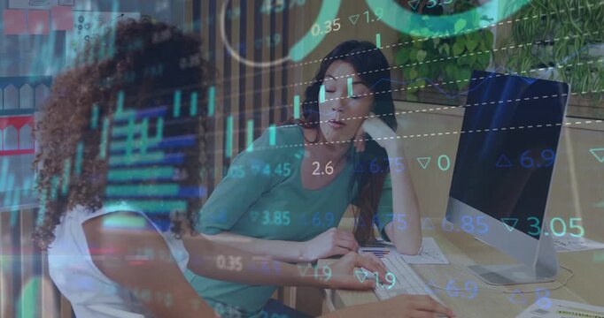 Market alert pinging two working left gesturing, right typing, charts pulsing for insight
