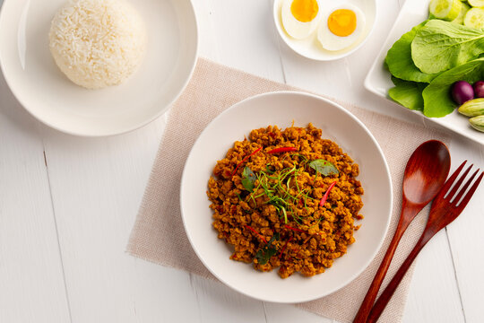 Southern Stir Fried ground pork with Yellow Curry Paste in white plate.Southern Style and Aromatic(Kuo Kling).Top view.